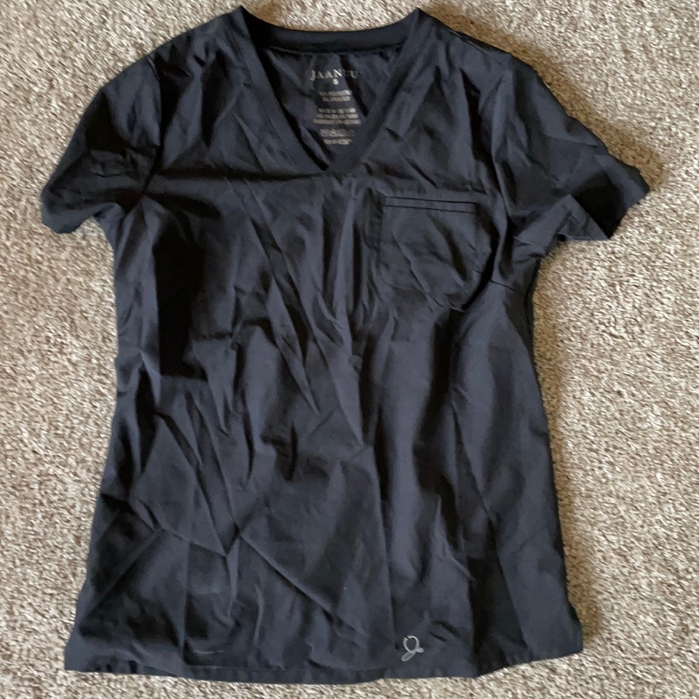 Jaanuu stride ribbed v neck scrub top